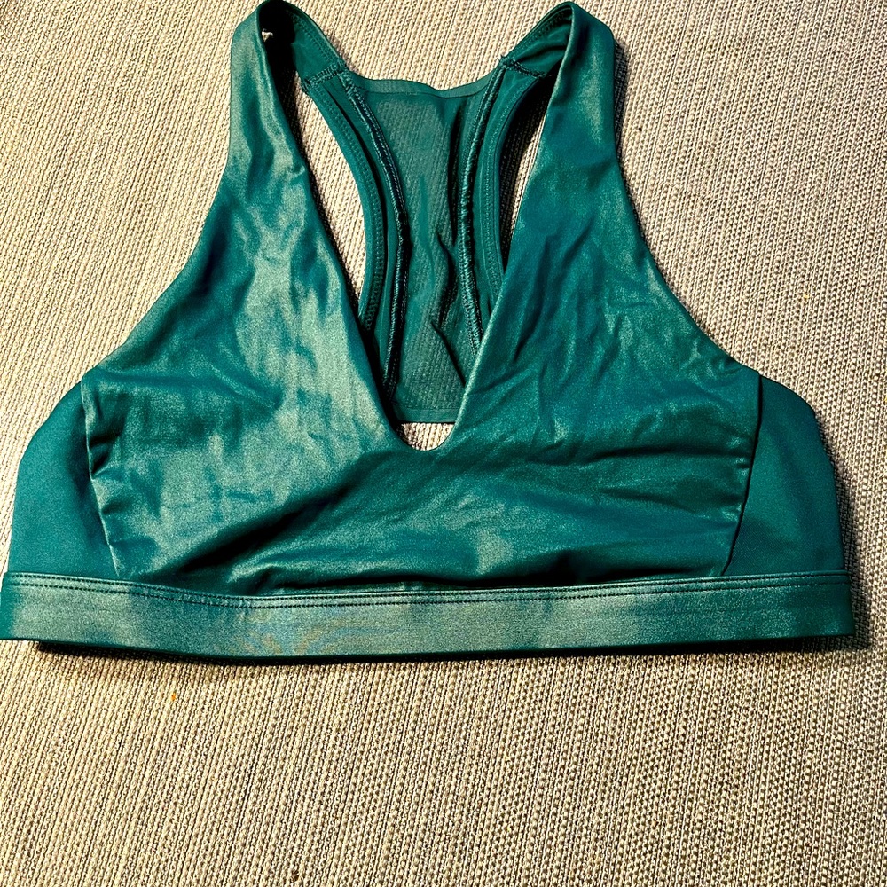 Victoria’s Secret sports bra. Never worn. Size med. Super cute shiny material